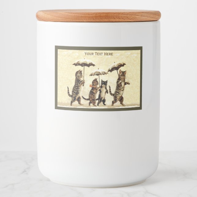 Schöne Katzen mit Kätzchen in Schneeschuhen Lebensmitteletikett (Vorderseite)