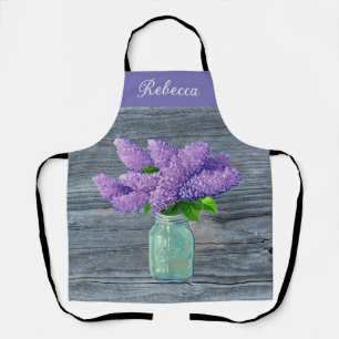 Schöne Lilacs im rustikalen Mason Jar Schürze