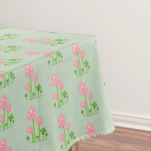 Schöne, rosa Blume auf hellgrünem Tablett Tischdecke