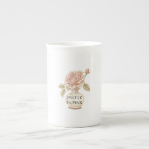 Schöne rosa Rosenblume in der Vase Prozellantasse