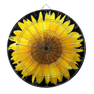 Schöne Sonnenblume auf schwarzem Dartboard Dartscheibe