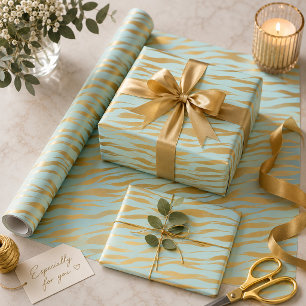 Schöne und goldene Streifen vor blauem Hintergrund Geschenkpapier