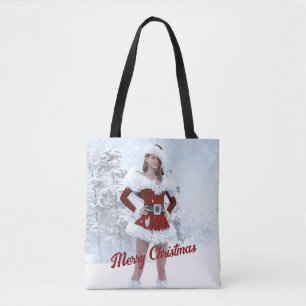 Schöne Weihnachtsfrau über den Winterschnee Tasche