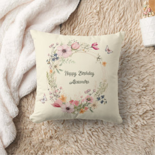 Schöner Blumenkranz und Schmetterlinge zum Geburts Kissen