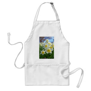 Schöner Garten mit weißen und gelben Daffodien Schürze