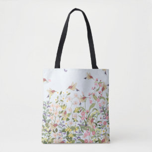 Schöner Kolibri in einer blumengeschmückten Blume Tasche