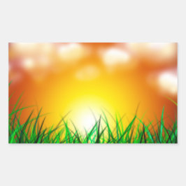 Schöner Sonnenaufgang über einem Grasfeld Rechteckiger Aufkleber