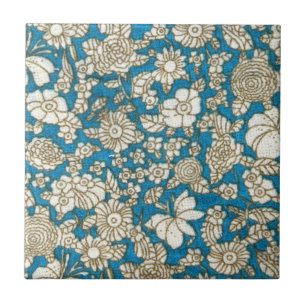 Schönes blaues Blumentextilmuster Fliese