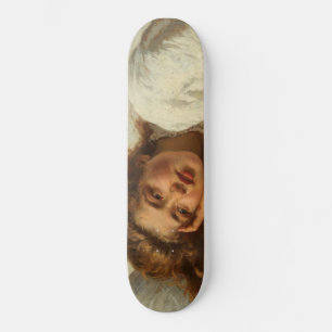 Schönes Mädchen liegt mit roten Haaren im Bett Skateboard