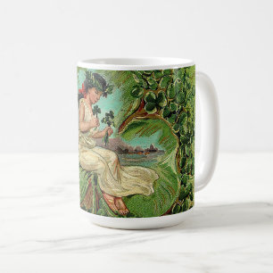 Schönes Mädchen mit Kleeblättern Kaffeetasse