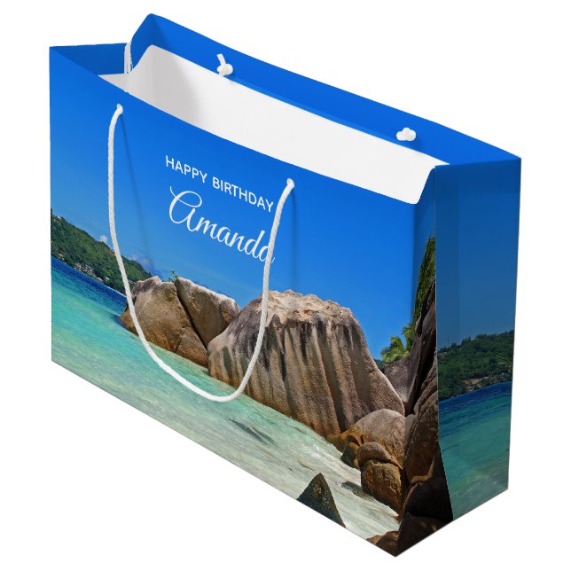Schönes tropisches Meer mit einem Felsstrand zum G Große Geschenktüte (Vorderseite Schrägansicht)