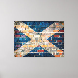Schottische Flagge an einer Ziegelmauer Leinwanddruck