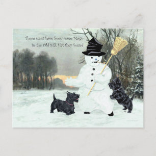 Schottische Terrier bauen einen Schneemann Postkarte