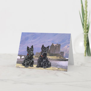 Schottische Terrier im Eilean Donan Castle Karte