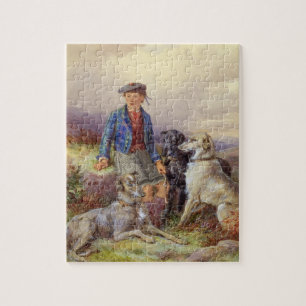 Schottischer Junge mit Wolfhounds in einem