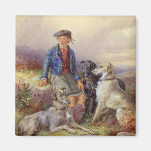 Schottischer Junge mit Wolfhounds in einem Magnet