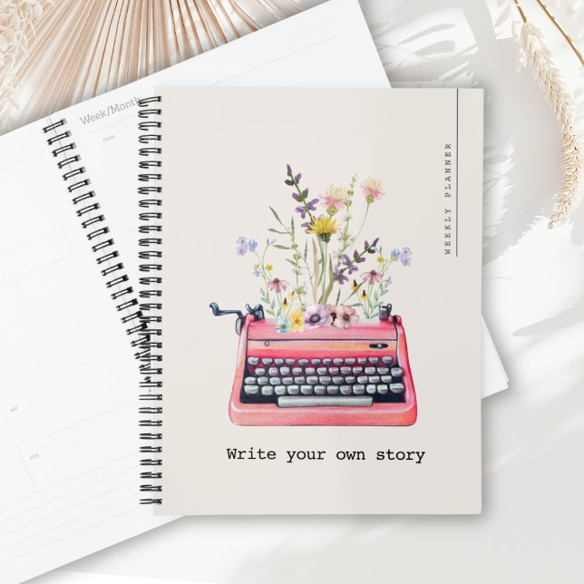 Schreiben Sie Ihre eigene Geschichte, Beige Weekly Planer (Weekly Diary Planner with cover text "Write your own story" alongside a typewriter & florals graphic)