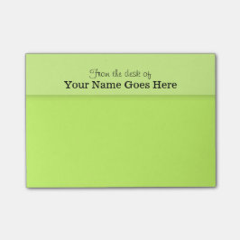 SCHREIBTISCH-Anmerkungsorganisator der grünen Post-it Klebezettel