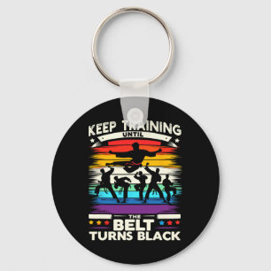 Schulung behalten, bis der Gürtel zu Black Karate  Schlüsselanhänger