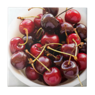 Schüssel mit Kirschen Fliese