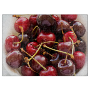 Schüssel mit Kirschen Schneidebrett