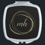 Schwarz-Gold-Abstrakt-Monogramm Taschenspiegel<br><div class="desc">Chic personalisierter Kompaktspiegel weist einen schwarzen Hintergrund mit Ihren Initial(en) oder Monogramm in modernen Kalligrafieschriften auf,  umgeben von einem abstrakten Kreiselement in Imitaten Goldfolie.</div>