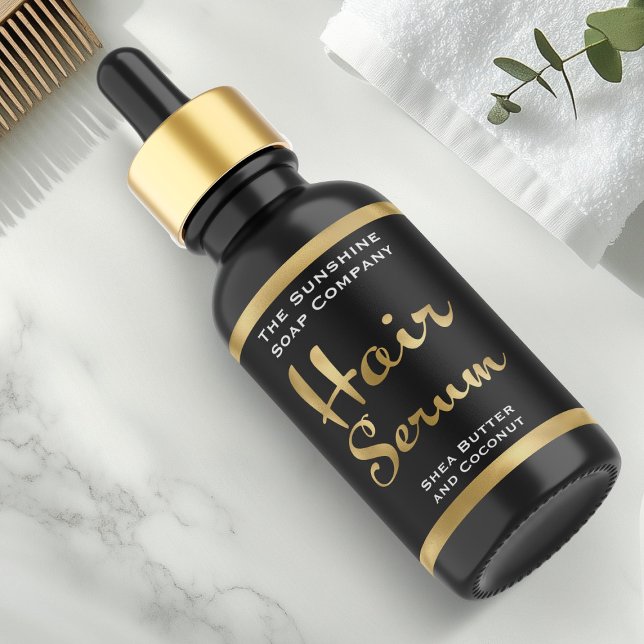 Schwarz-Gold-Haarserumflasche (Von Creator hochgeladen)