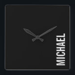 Schwarz Moderner Minimalistischer Personalisierter Quadratische Wanduhr<br><div class="desc">Modernes Minimalistisches Design mit personalisiertem Namen in weißem,  modernem,  fett formatiertem Schriftart auf schwarzem Hintergrund.</div>
