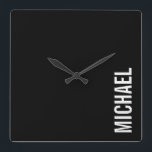 Schwarz Moderner Minimalistischer Personalisierter Quadratische Wanduhr<br><div class="desc">Modernes Minimalistisches Design mit personalisiertem Namen in weißem,  modernem,  fett formatiertem Schriftart auf schwarzem Hintergrund.</div>