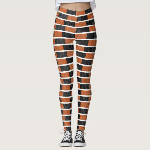 Schwarz-orange Halloween-Wasserfarbenstreifen Leggings