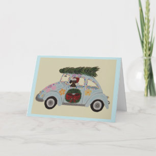 Schwarz-roter Dachshund in Hippie-Auto zu Weihnach Karte