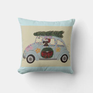Schwarz-roter Dachshund in Hippie-Auto zu Weihnach Kissen