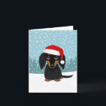 Schwarz und Tan Dackel Weihnachten<br><div class="desc">Diese bezaubernde Weihnachtskarte ist perfekt für langhaarige Schwarz-Bein-Dackel-Liebhaber! Das von Hand gezeichnet Bild des festlichen und liebenswerten Dackel-Hundes mit einer Weihnachtsmannmütze fängt den verspielten Geist der Ferien ein. Passen Sie das Innere mit Ihren eigenen, durchdachten Gefühlen an, um in dieser Saison allen Freude zu vermitteln, die auf Ihrer Liste stehen....</div>