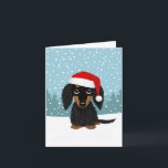 Schwarz und Tan Dackel Weihnachten<br><div class="desc">Diese bezaubernde Weihnachtskarte ist perfekt für langhaarige Schwarz-Bein-Dackel-Liebhaber! Das von Hand gezeichnet Bild des festlichen und liebenswerten Dackel-Hundes mit einer Weihnachtsmannmütze fängt den verspielten Geist der Ferien ein. Passen Sie das Innere mit Ihren eigenen, durchdachten Gefühlen an, um in dieser Saison allen Freude zu vermitteln, die auf Ihrer Liste stehen....</div>