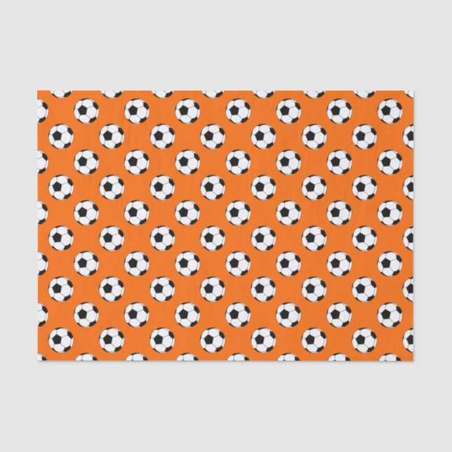 Schwarz-Weiß-Fußball-Bälle auf Orange Seidenpapier (Vorderseite)