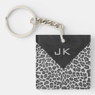 Schwarz-Weiß-Leopard-Printwerbung für Monogramm Schlüsselanhänger