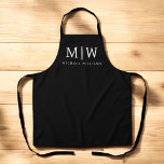 Schwarz-Weiß-Minimalistisch-Modern-Monogramm Schürze<br><div class="desc">Die Minimalistische Monogram Kollektion Schwarz/Weiß: Einfache Einfachheit und Eleganz in unseren minimalistischen Designs, die so gestaltet sind, dass sie Ihren Stil mühelos erweitern. Diese Kollektion wurde mit einem scharfen Blick für moderne Ästhetik gestaltet und weist elegante Schwarz-Weiß-Designs auf, die durch personalisierte Monogramme noch verstärkt werden. Von der schicken Schreibwaren bis...</div>