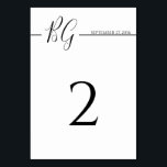 Schwarz-Weiß-Minimalistisch-Monogramm-Hochzeit Tischnummer<br><div class="desc">Dieses Design zeichnet sich durch ein elegantes, minimalistisches Schwarz-Weiß-Monogramm aus. Das Hochzeitstag steht auf der Linie, die die Initialen von Braut und Bräutigam gruppiert. Schwarz-Weiß-Schrift Typografie Hochzeitsdesign. Die Kombination aus Schwarz und Weiß schafft einen eleganten, trendigen und eleganten Stil. Elegantes Hochzeitsdesign mit modernen Elementen in der Tischnummer. Auch die passenden...</div>