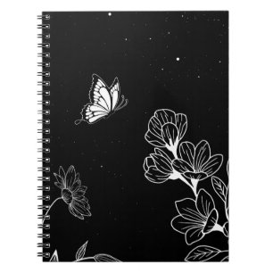 Schwarz-Weiß-Schmetterling und Blume in der Nacht  Notizblock