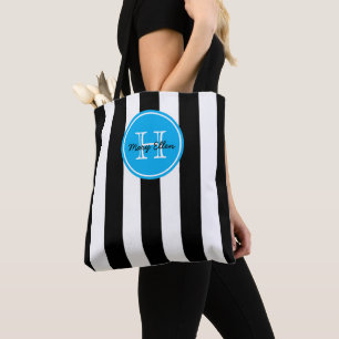 Schwarz-Weiß-Streifen mit leuchtend blauem Monogra Tasche