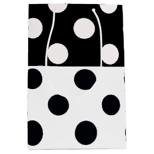 Schwarz-weiße halbe Farbtrennung inverse Polka-Pun Mittlere Geschenktüte
