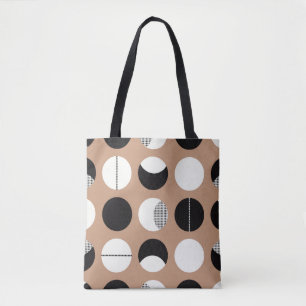 Schwarz, weiße Kreise, brauner Hintergrund. Tasche