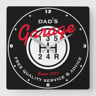 Schwarz-weiße Umschalttaste des Vaters oder einer Quadratische Wanduhr