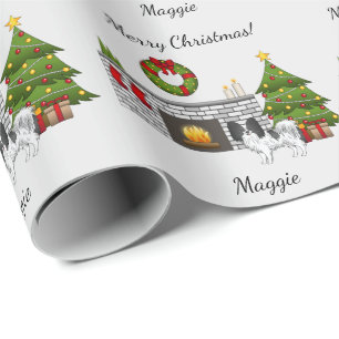 Schwarz-weißer Papillon-Hund in einem Weihnachtszi Geschenkpapier