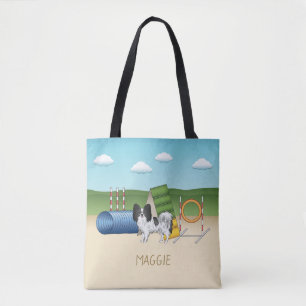 Schwarz-weißer Papillon mit Agility-Ausrüstung Tasche