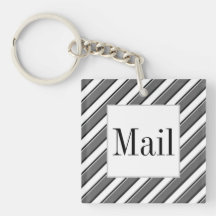 Schwarz-weißer und grauer Post-Schlüssel Keychain