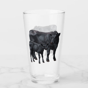 Schwarzanguskühe und Niedliches Kalb Glas