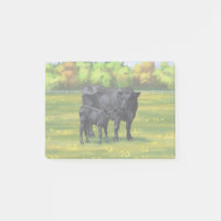 Schwarze Anguskühe und Niedliches Kalb im Sommerwe