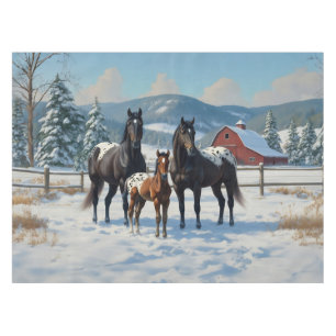 Schwarze Appaloosa Pferde auf einem Bauernhof im W Tischdecke