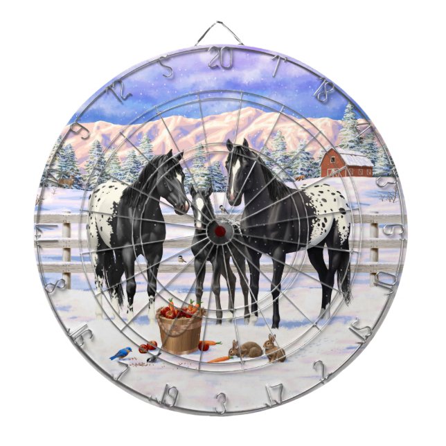 Schwarze Appaloosa Pferde auf einem schneebedeckte Dartscheibe (vorne)